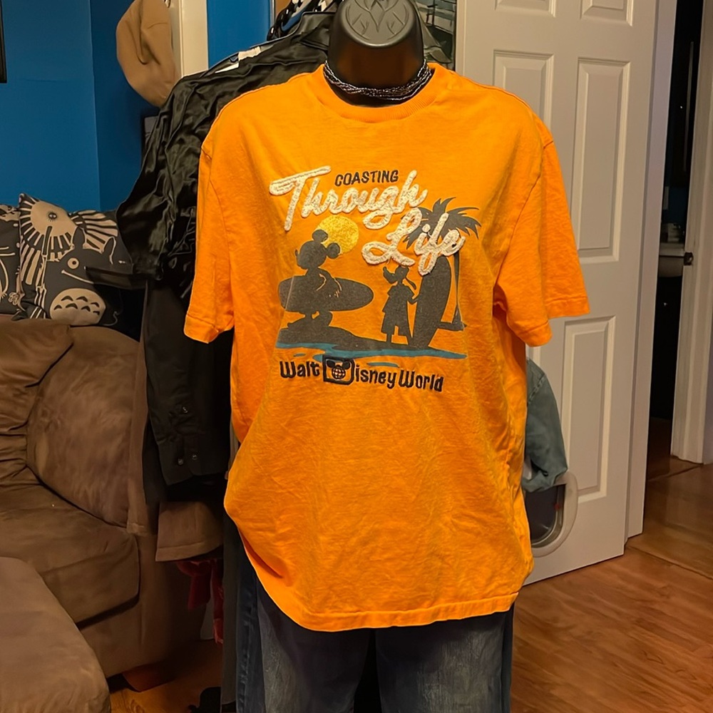 Orange “Costing Through Life” Walt Disney World tee w/Mickey & Goofy
